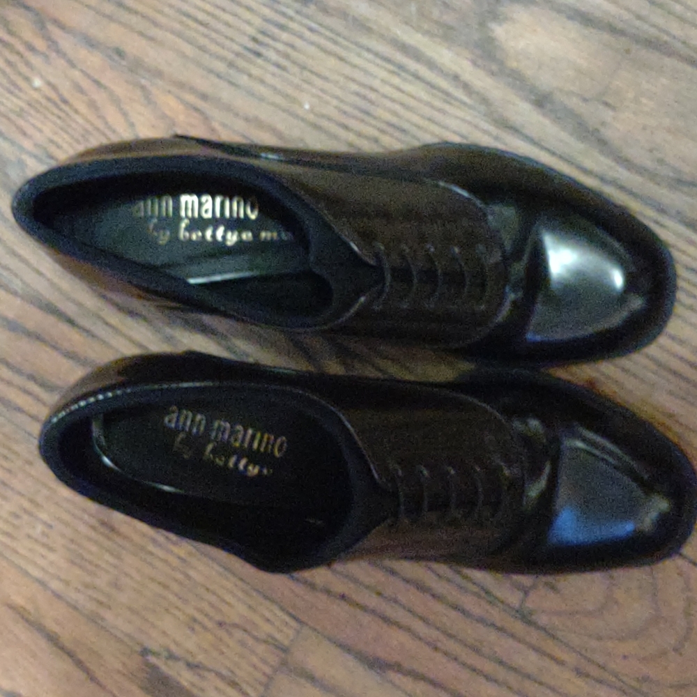 Never worn brown and black heeled ankle boots